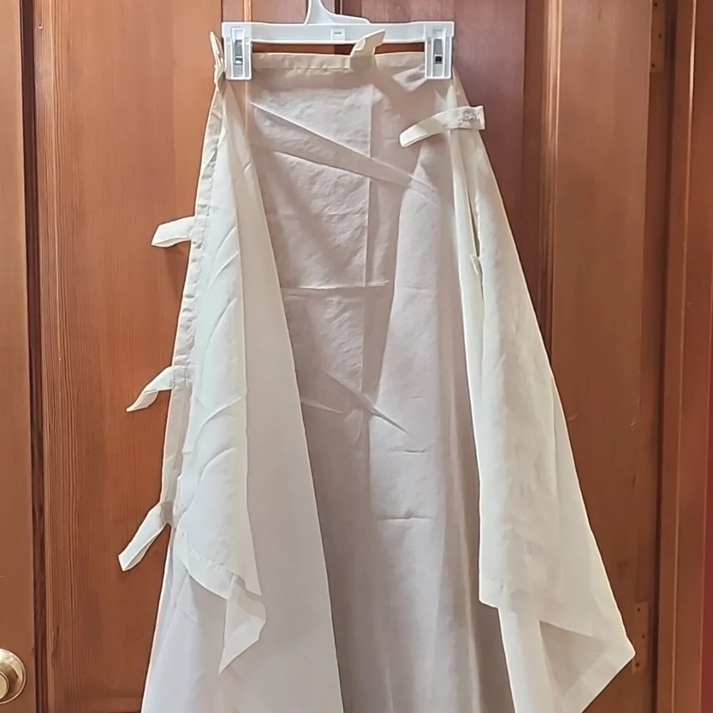 4 Sheer tan curtain panels with button loop top